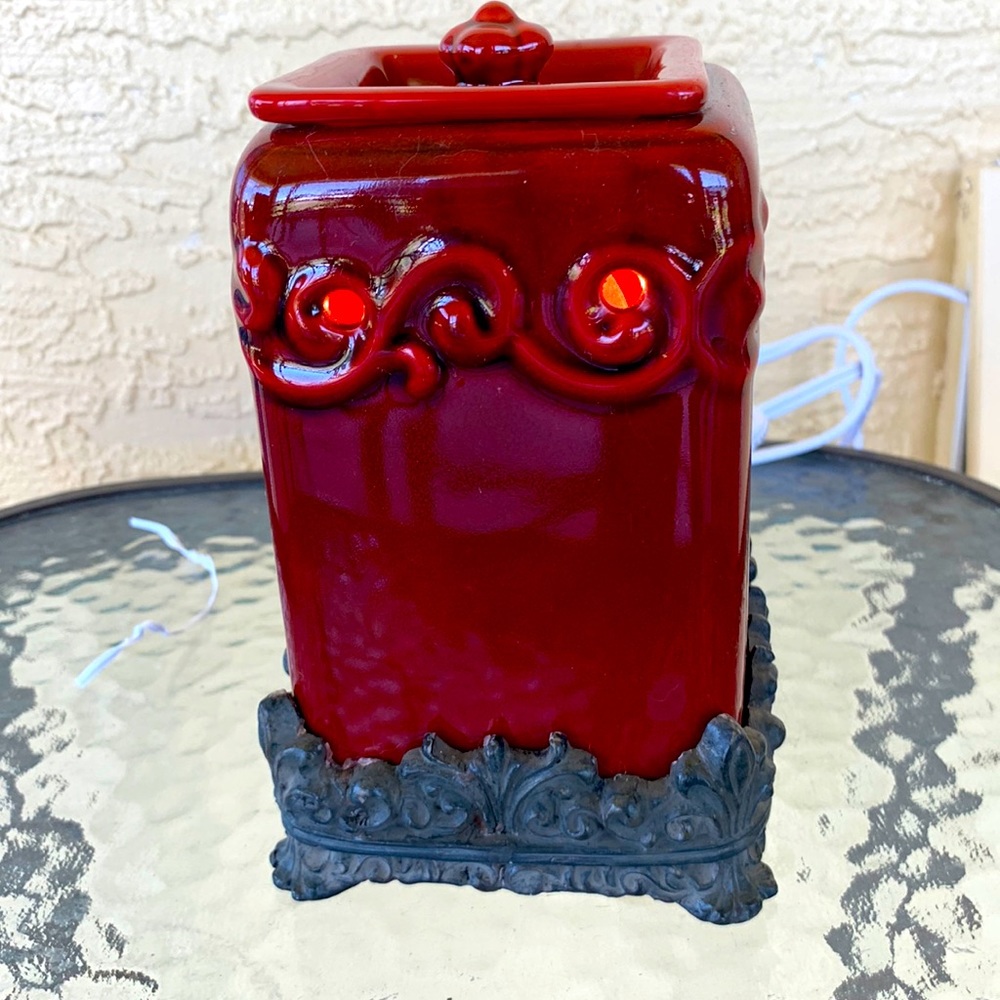 Like new wax or essential oil burner with light.